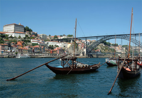 Boats Porto wine barrels Rio Douro photo